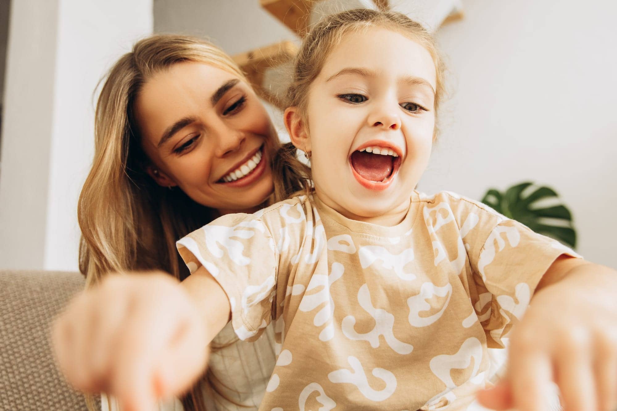 Happy family smiling together at London Square Dental Centre in Calgary